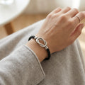 Zwarte gevlochten leren armband met Infinity-ontwerp