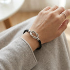 Zwarte gevlochten leren armband met Infinity-ontwerp