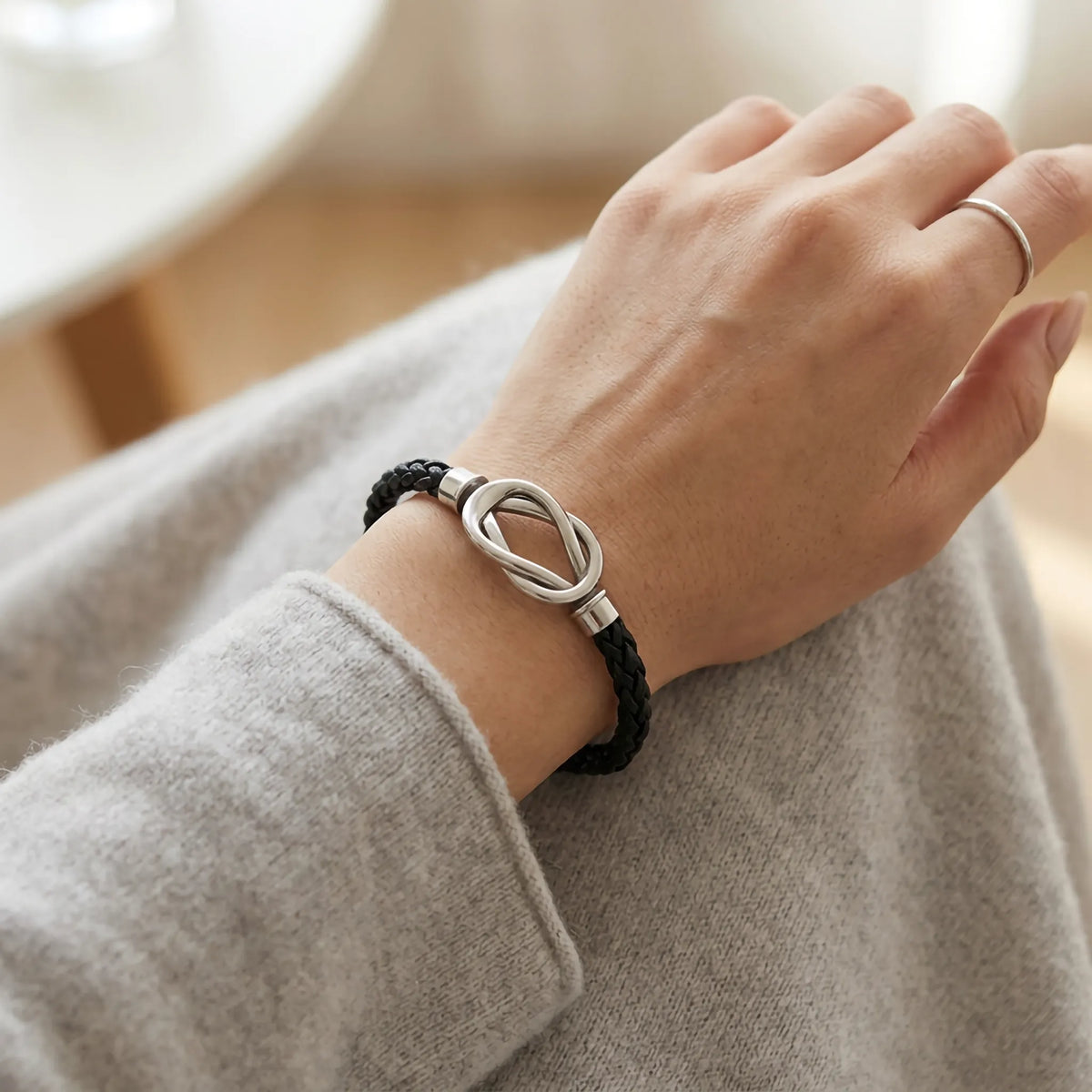 Zwarte gevlochten leren armband met Infinity-ontwerp